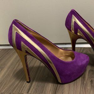 Taylor Says purple heels with painted bottoms
